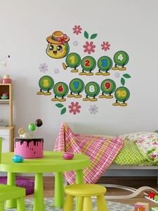 Detailed view of colorful cartoon caterpillar number wall stickers in a bright nursery setting