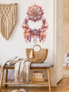 Dettaglio di adesivi murali con fiori mandala rosa e frange boho su sfondo bianco pulito