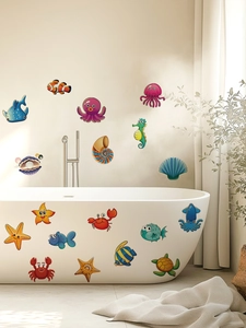 Detail showing waterproof cartoon marine animal stickers on a bathtub and bathroom wall