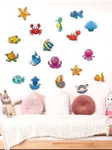 Detail showing colorful PVC sea creature stickers including starfish and octopus on a white wall