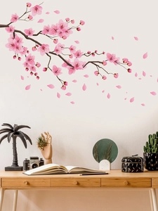 Dettaglio di adesivi murali con ciliegio rosa per decorazione studio moderno