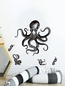 Detailed view of black octopus wall stickers in a modern minimalist nursery room