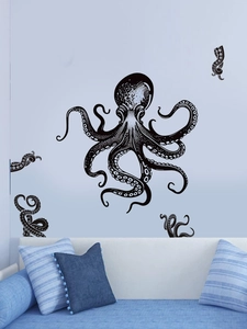 Detail of octopus wall sticker in black hand-drawn style above a blue sofa