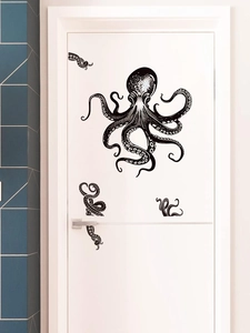 Artistic black octopus wall decals applied to a white door for creative home decoration