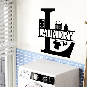 Détail de l'autocollant mural Laundry noir avec icônes de machine à laver sur mur blanc