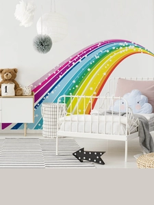 Detail of colorful rainbow wall decal with white stars for a cozy kids bedroom decor