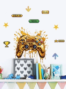 Detail of golden gaming controller wall decal with pixel icons on white bedroom wall
