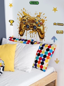 Close-up of golden gaming controller wall stickers in a modern teenager bedroom