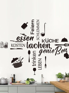 Kitchen wall decal featuring German typography and minimalist utensil icons in matte black