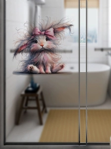 Close-up of fluffy Easter bunny sticker with pink bow on a glass shower door
