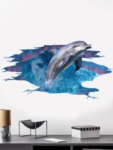 Detail of 3D dolphin wall sticker breaking through a realistic blue wall crack effect