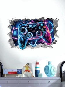 Close-up of 3D cracked wall effect gaming wall sticker with neon gamepad on a bedroom wall