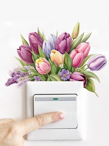 Detail of self-adhesive tulip wall stickers applied over a modern light switch plate