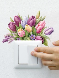 Detail of tulip and lavender floral wall stickers applied above a light switch panel