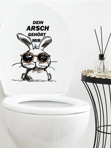 Funny cartoon rabbit toilet seat decal with bold German text on white lid