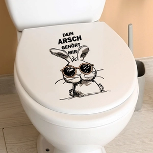 Funny cartoon rabbit toilet seat decal with humorous German text on a white lid
