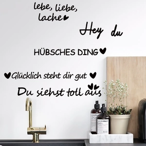 Inspirational German quote wall decal with hearts for a minimalist home decor look