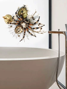 Realistic spider, web, and dry leaf wall sticker detail on a modern bathroom wall