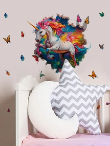 Detail of 3D rainbow unicorn and butterflies wall decal with broken wall effect in kids room