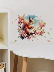 Detail of squirrel wall sticker with watercolor peach blossoms on a branch