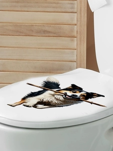 Realistic Border Collie with stick sticker detail on a white ceramic toilet lid