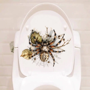 Realistic spider and dead leaf waterproof PVC sticker applied on a white toilet lid