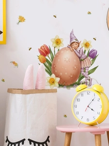 Detailed view of Easter elf and floral egg wall decal in a cozy bedroom setting
