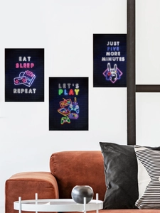 Three-piece neon gaming wall art set featuring slogans on a dark brick background