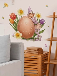 Detail of Easter elf wall sticker with colorful eggs and tulips in a cozy living room