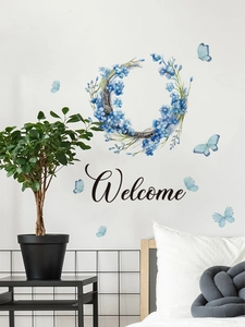 Adesivo da parete con ghirlanda blu fiori scritta Welcome e farfalle per camera letto