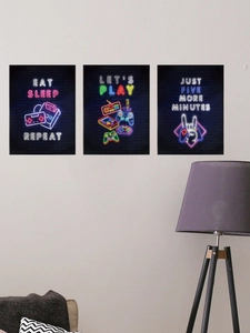 Neon gaming wall decals featuring game controllers and slogans on dark brick background