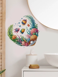 Detail view of heart-shaped marine wall stickers with fish and coral in a bathroom