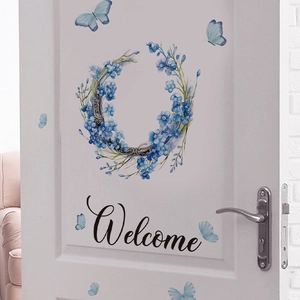 Adesivo murale ghirlanda di fiori blu Welcome con farfalle per decoro della porta