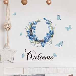 Adesivo da parete ghirlanda blu con farfalle e testo Welcome per decoro casa