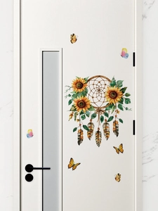 Detailed view of sunflower dreamcatcher wall decal with butterflies on a white door