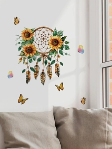 Detail of sunflower dreamcatcher wall sticker with butterflies in a cozy living room setup