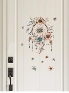 Dreamcatcher wall decal with flowers on a white door in a soft Morandi color palette