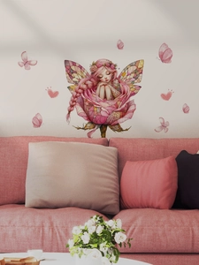 Detail of cute flower fairy wall sticker with pink butterflies in a warm living room