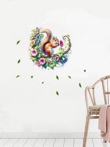 Close-up of squirrel and morning glory watercolor wall stickers on white living room wall