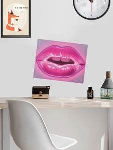 Close-up of pink neon lips wall sticker on a minimalist white bedroom wall