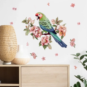 Cute parrot with pink flowers wall sticker on a white wall in a cozy living room scene