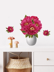 Detail of red floral wall decal with pink peonies in a white vase on home interior wall