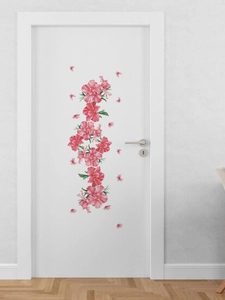 Detail showing pink azalea floral wall stickers applied to a white minimalist interior door