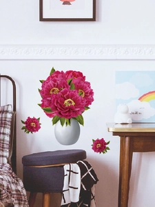 Detail view of red peony flower wall decals in a white vase for living room decor