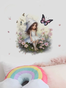 Close-up of butterfly and floral wall decals featuring a girl in a fantasy bedroom setting