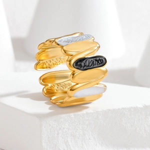 Vintage irregular geometric gold open ring with black and white enamel wavy details