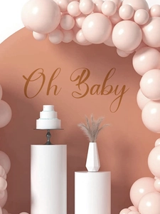 Detail of pink balloon arch and Oh Baby wall stickers for birthday party decor