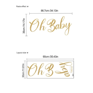 Golden glitter Oh Baby wall sticker set for party decor measuring 86.7cm x 36cm