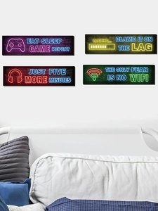 Neon game style wall art set featuring controller and eat sleep game repeat slogan