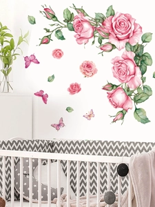 Detailed watercolor pink rose wall stickers with butterflies in a nursery room scene